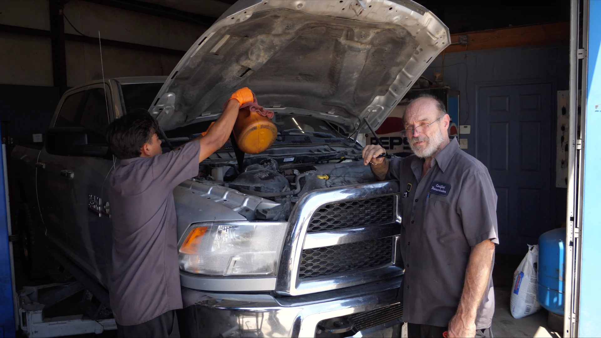 Certified Transmission technician working on a truck
